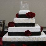 Black & White Wedding Cake with Red Rose Accents made by Classy Chocolate in Liberty Missouri